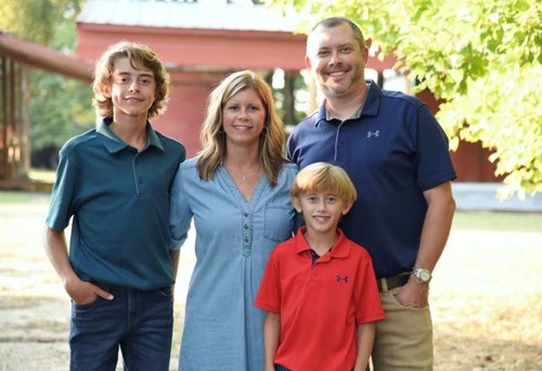 Jay Smith with wife and two sons